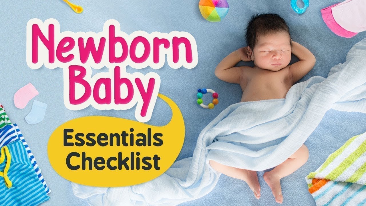 Essential newborn baby items including diapers, baby clothes, bottles, blanket, and pacifier neatly arranged.
